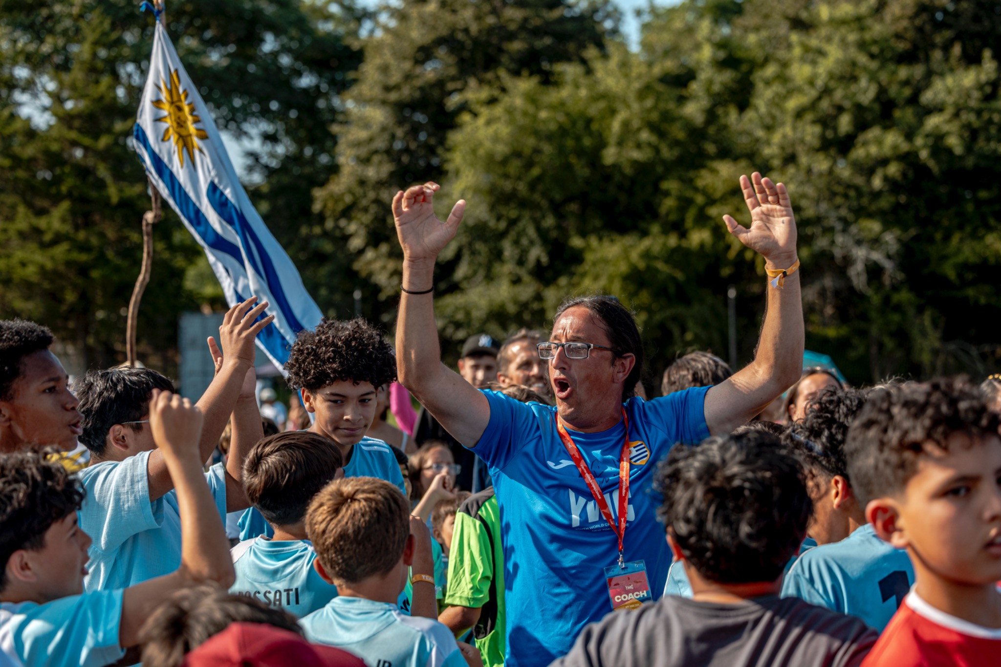 Coach celebrating with Uruguayan Soccer Club players